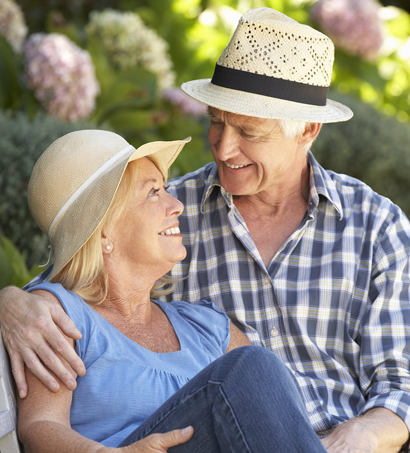 senior couple relaxing in garden retirement income future financial solutions texas